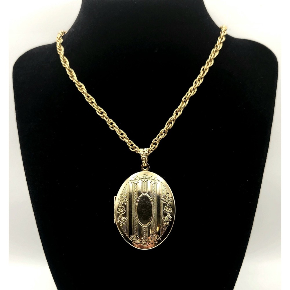 1928 Jewelry Gold Tone Oval Floral Engraved Locket Necklace 36 Inch Rope Chain